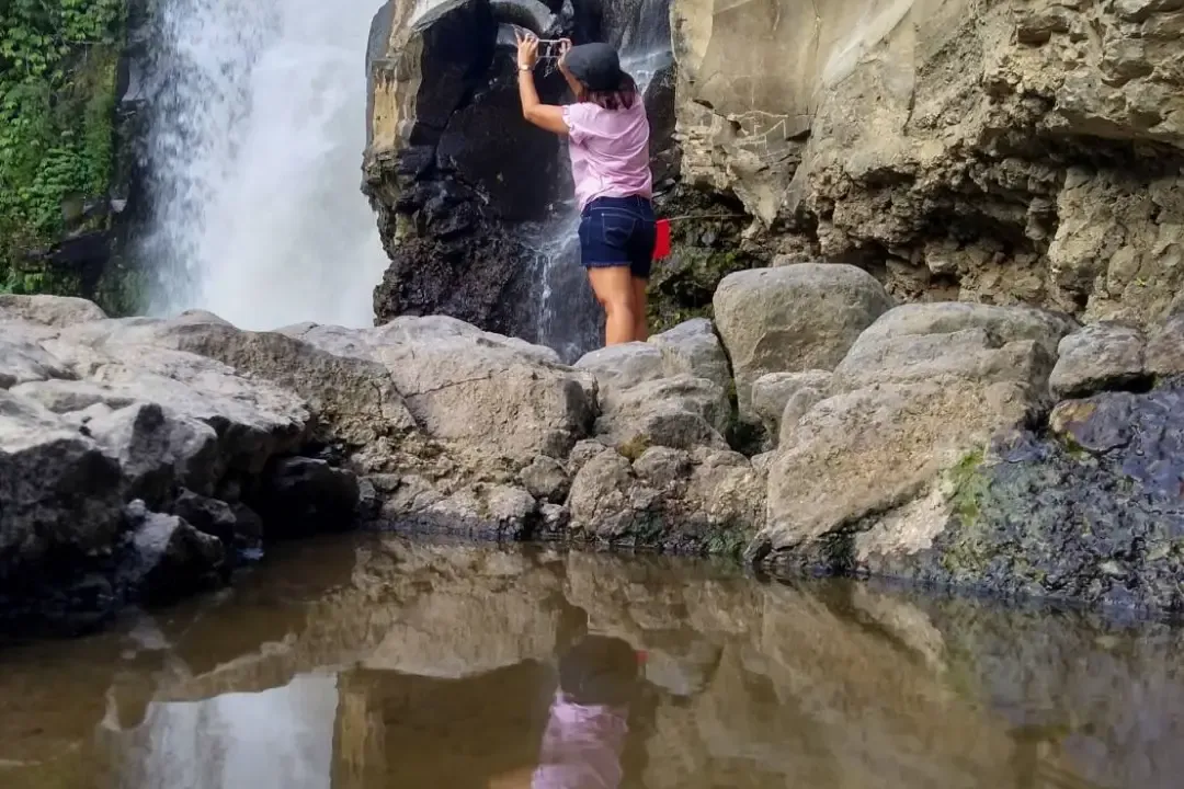 Taking Picture at Tegenungan Waterfall